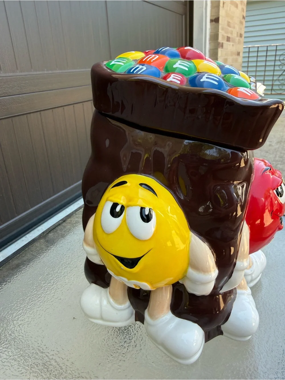 M&M'S Ceramic Cookie Jar with Red and Yellow Characters and Multicolor Candy Top